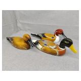 Three wood ducks