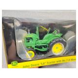John Deere LA tractor with mower display