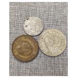 Three foreign coins