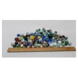 Various Sizes of Marbles and Shooters