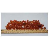 Orange marbles and 2 shooters