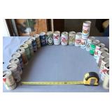 Older empty beer collector cans