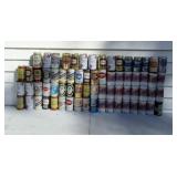 Empty older beer cans from various brands