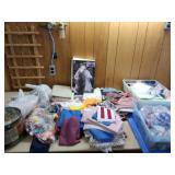 Totes of material and sewing thread