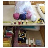 Contents of drawer being spools of thread ,