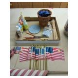 Little flags, pencils paint brushes and paint