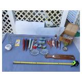 Candles, music box parts, vase and wooden paddle