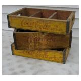 Three old wood Coca-Cola pop crates