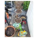 Flower pots, potting soil and weed control