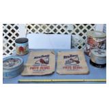 Two new RedBird gunny sacks and tins