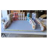 Older empty beer cans from various brands