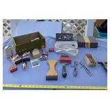 Tacks, fabric puller and spring clips