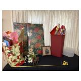 Christmas tote full of wrapping paper, pillow,