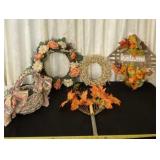 Decorative wreaths, basket and rake