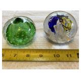 Leftonï¿½s and flower paperweight