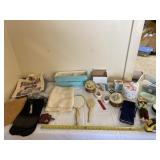 Musical snow globes, bathroom supplies, bags and