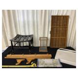 Quilt hanging rack, black bench, glass keepsake