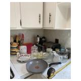 Toaster, coffee brewer, skillet, jars, kitchen