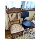 Leather office chair on wheels and wooden chair