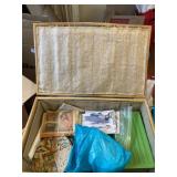 Wooden basket full of patterns and sewing