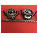 Tea Pots- one on left chipped
