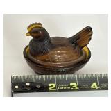 Brown miniature Hen on Nest