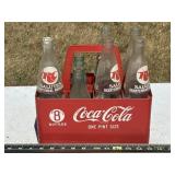 Coca Cola plastic carrier (cracked) with glass