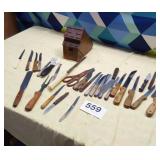 Assortment of knives and miscellaneous utensils