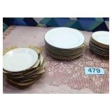 Set of 8 plates,bowls, salad plates