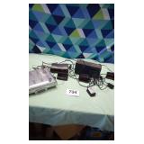 Assortment of alarm clocks ,under counter radio