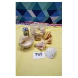 Assortment of shells and shell dish and sand