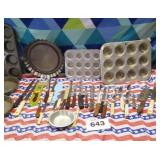 Assortment of bakeware and knives