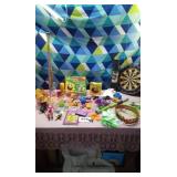 Assortment of toys and dart boards