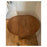 33.5 x 25 round drop leaf table with sections up,