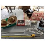 Curtain rods, hangers, hats, alarm clocks and box
