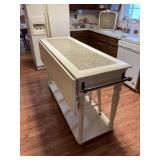 White kitchen island 65 l x 36 t x 22 wide and 36