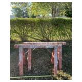 Two wooden sawhorses