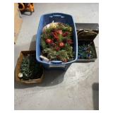 Tote of Christmas lights and decor