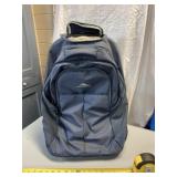 High Sierra back pack or roll around luggage -