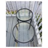 Two smaller glass topped patio tables