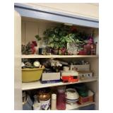 Contents of shelves including Yankee candles,