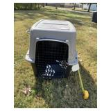 Large dog crate with some little fingers art