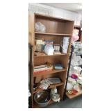 Bookshelf w contents foodprep, sealer, napkins,