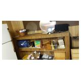 Contents on shelves sleeping bag, baskets