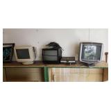 Computer monitors sharp TV and VHS tapes DVD s