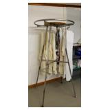 Adjustable round clothing rack 70 in tall , 3 ft