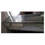 Display case, 5ft x l39 x 20 in w contents and