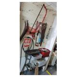 Saws , hammer , jumper cables sockets caster.