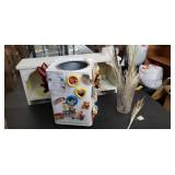 Rotating magnetic metal display , vase of floral