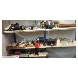 2 shelving units each 4 ft long w contents,